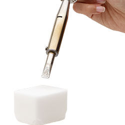 Soldering iron and ammoniac block